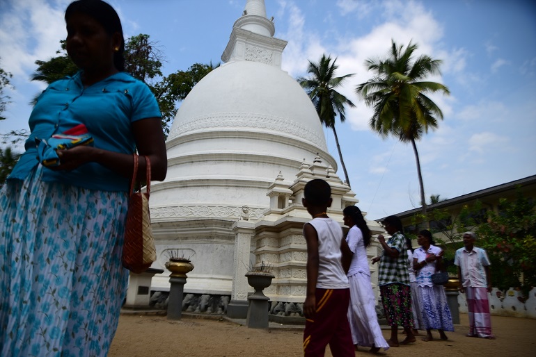 Buddhists visiting a temple in Sri Lanka. (Photo: World Watch Monitor)