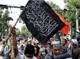 Thousands of Muslim gathered in Indonesia's capital Jakarta on 26 October last year after a Muslim flag was burned. The incident also triggered a response from a Christian student and he is now facing a prison sentence for blasphemy. (Photo: Getty Images)