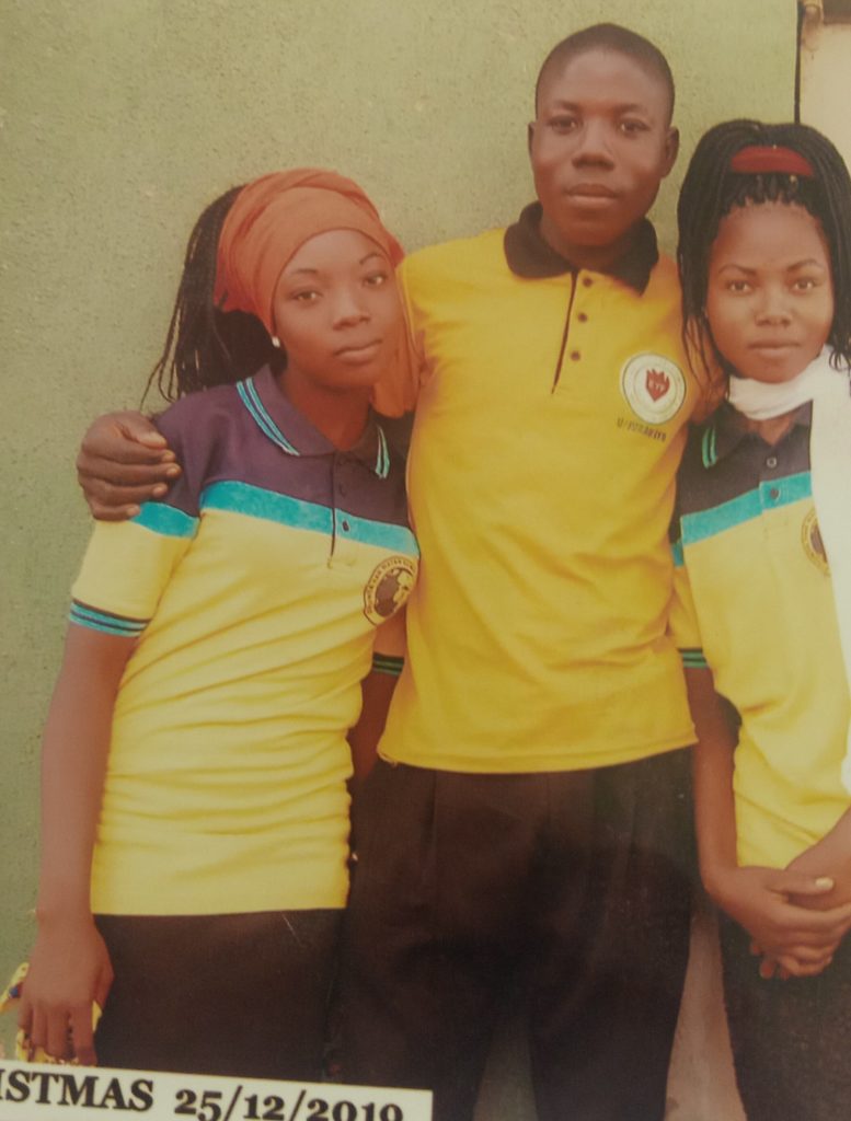 Joy, with her older brother and sister, Christmas Day, 2019 (Credit: Hausa Christian Foundation) 