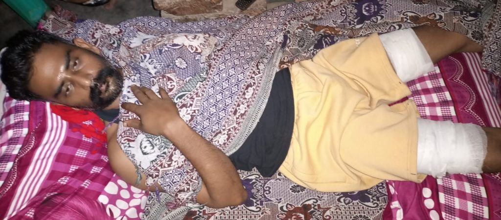 Asif Masih in bed recovering from bullet wounds in both thighs, Shera Kot Sep 2021